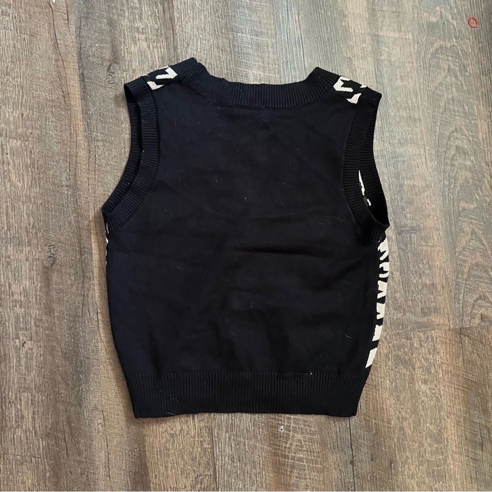 Black and white checkered vest